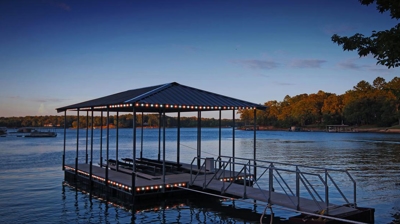 Cottage dock lit up at night