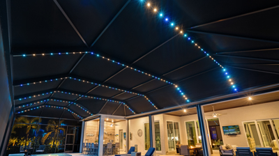 Professional lanai lighting system installed on a modern screen enclosure in Southwest Florida