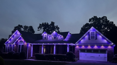 Permanent LED holiday lights track color-matched to a home's trim