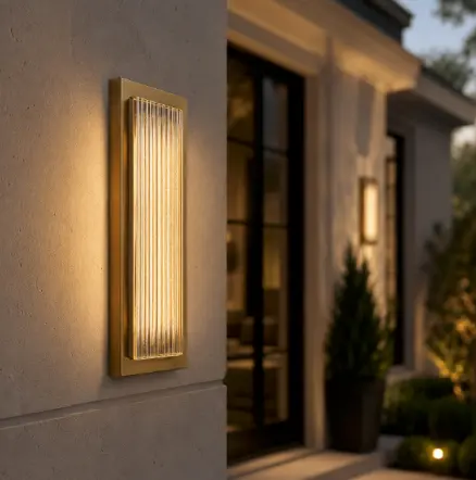 Exterior flush-mounted lights with a gold trim on a modern home.