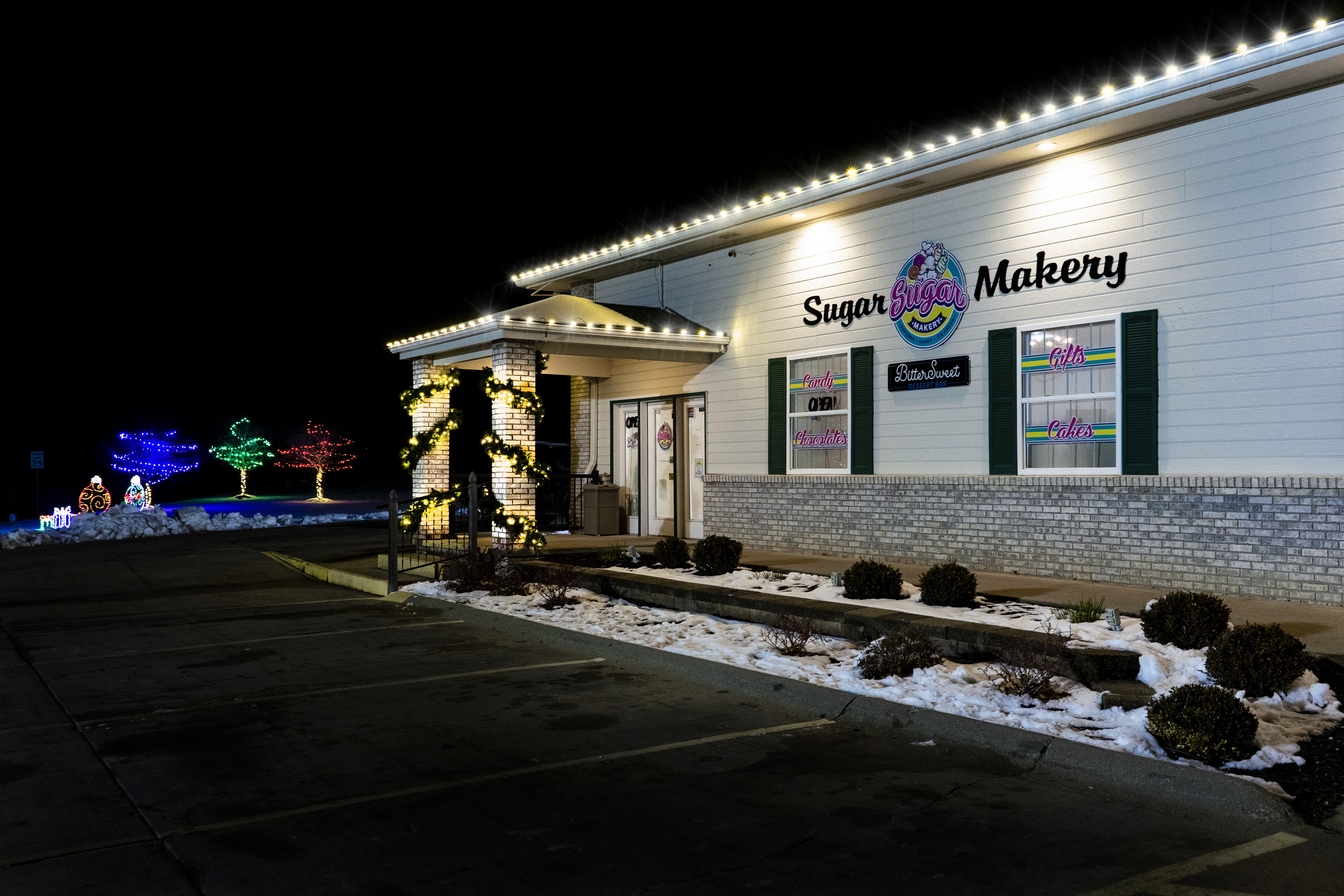 Lighting on roofline and pillars of building