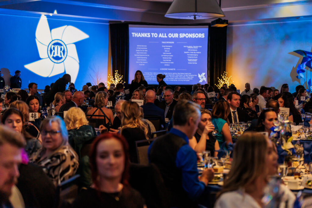 Cory Yocham, and his wife, Jillian (bottom left) at Realities for Children's Pinwheel Gala 2024