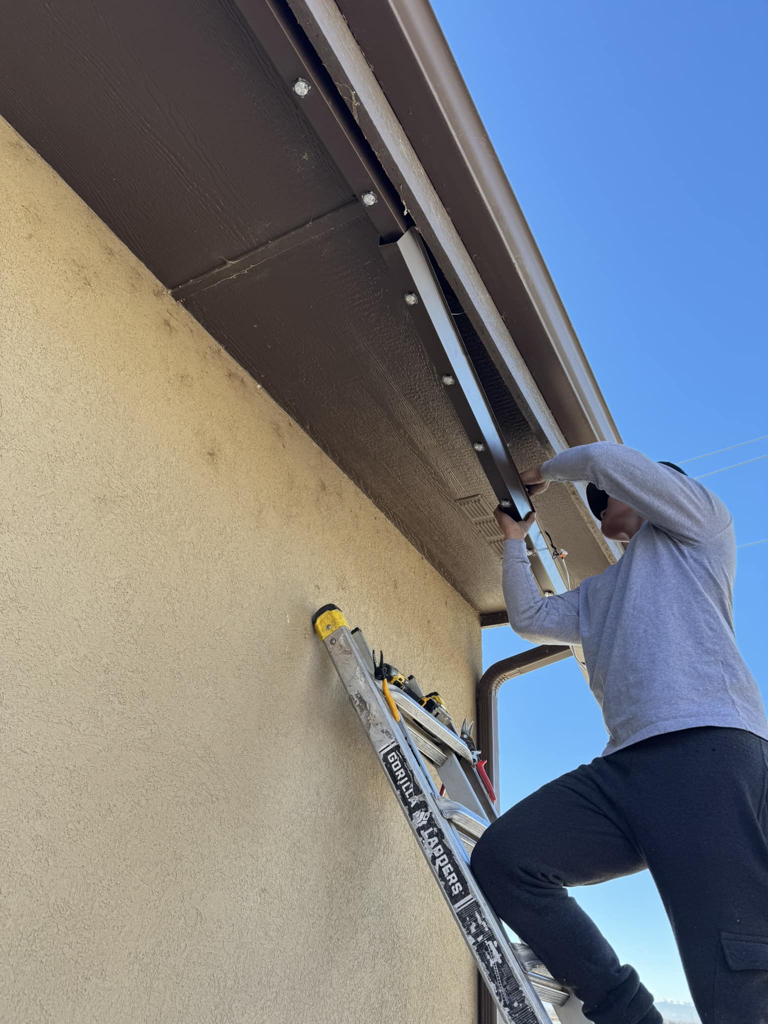 Vaughn Helling Installing Gemstone Lights