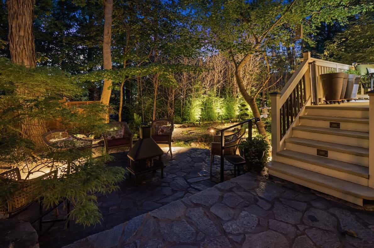 landscape lighting on house in the backyard