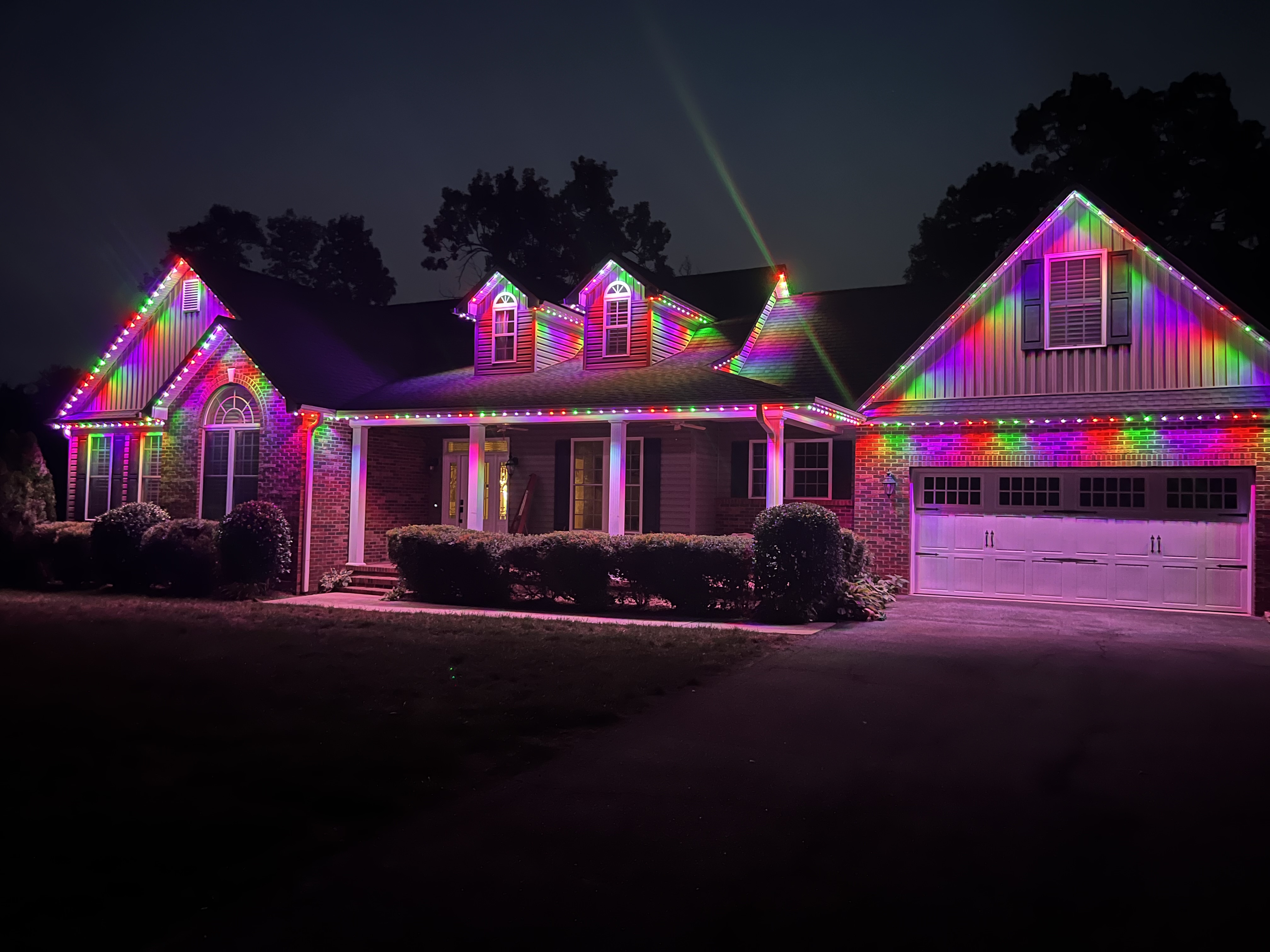 Color-changing trim lighting installed on a modern roofline