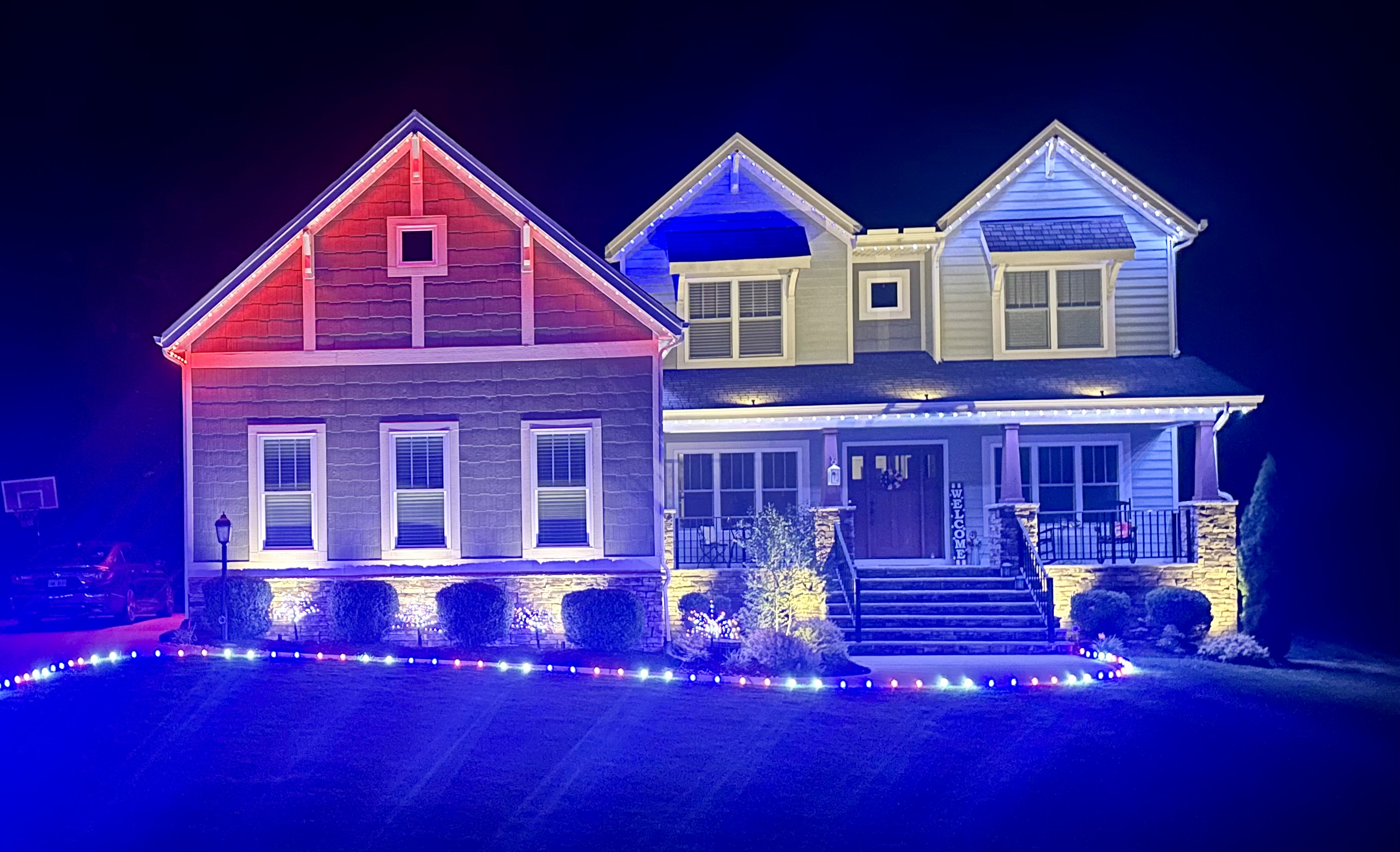 Colorful 4th of July permanent and landscape lighting