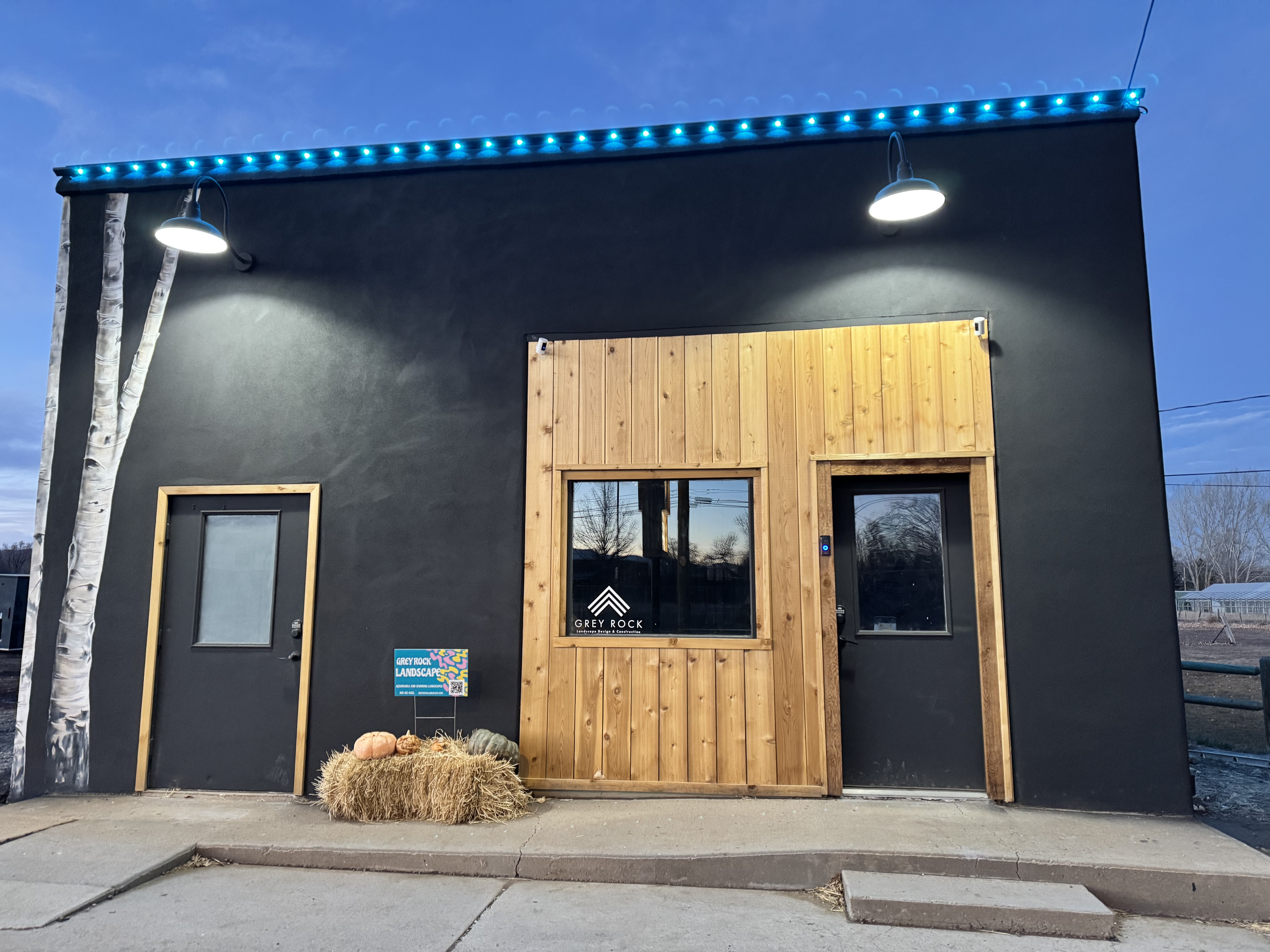 Blingle's Install of Gemstone Lights on Grey Rock Landscape and Construction's Office