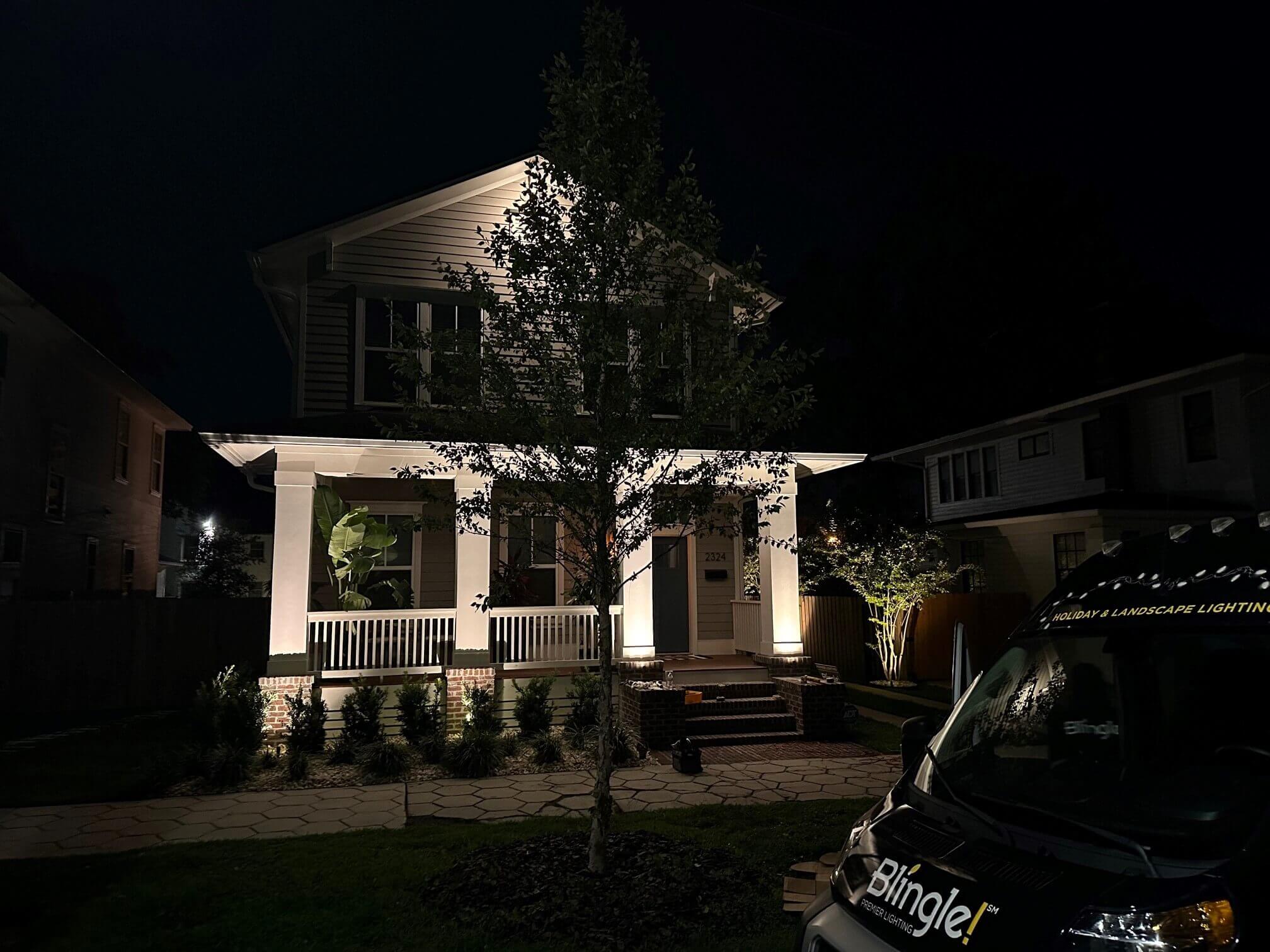 home with outdoor lighting